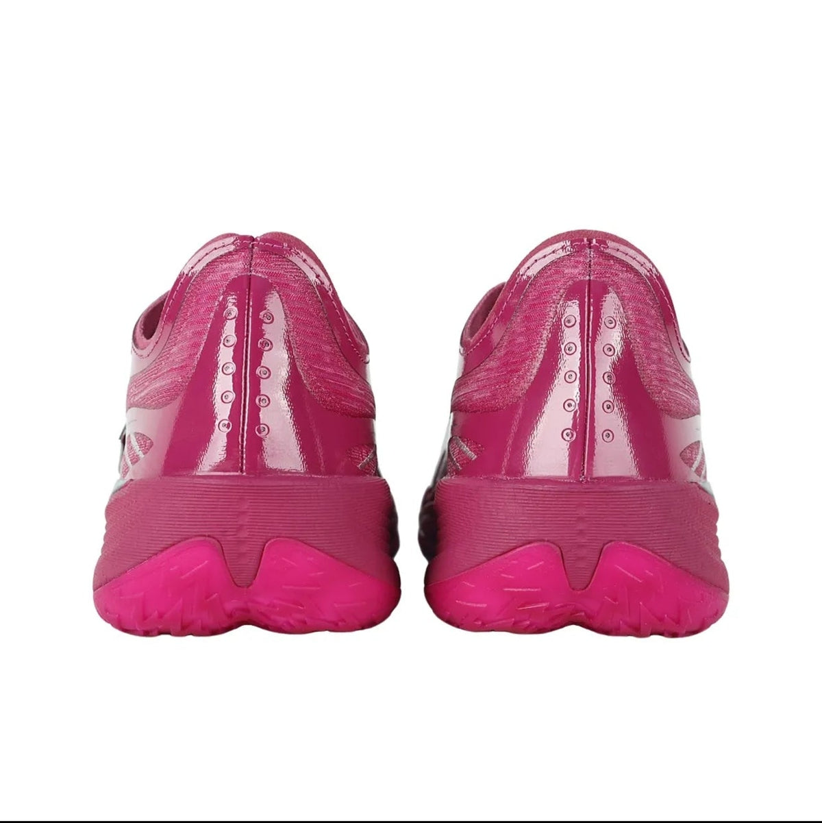 A pair of pink athletic sneakers shown from the back, displayed on a white background within a mobile app screenshot.
