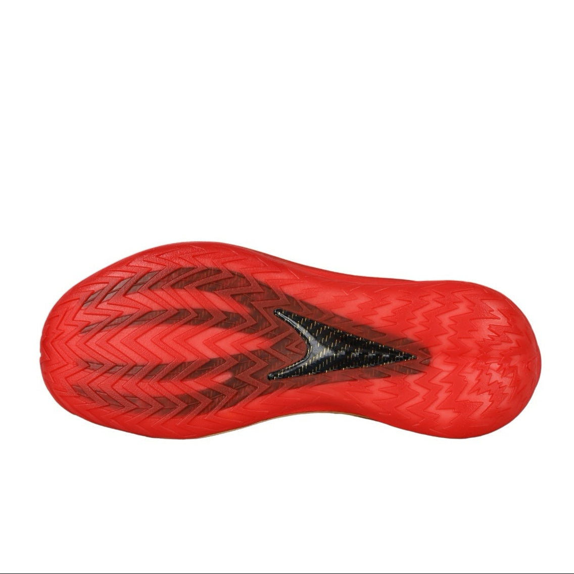 A close-up of a red athletic shoe sole with black textured tread patterns and a black central accent, shown against a plain white background.