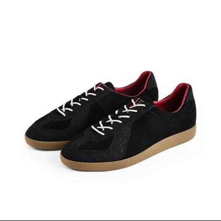 Black suede and canvas low-top sneakers with white laces and gum soles, shown on a white background with text below reading 'BLACK RACER 5255'.