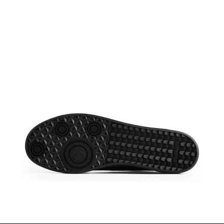 A black shoe sole viewed from the bottom, centered on a white background with text below reading 'BLACK STORK 5265'. The photo appears to be a screenshot from a mobile app, with black bars and interface icons visible around it.