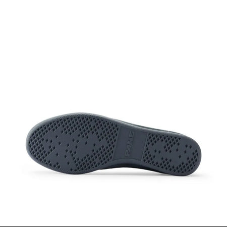 A close-up of a shoe sole, showing the tread pattern and embossed branding, on a white background with black borders from a mobile app screenshot.