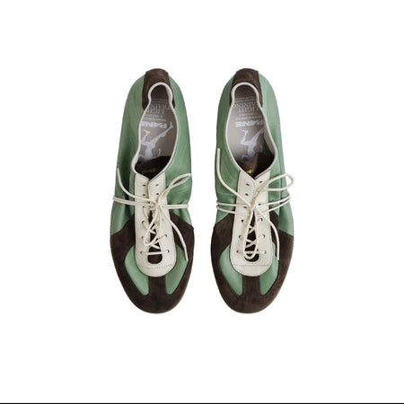 A pair of mint green and brown lace-up shoes with white laces, shown from a top-down view on a white background within a mobile app screenshot.