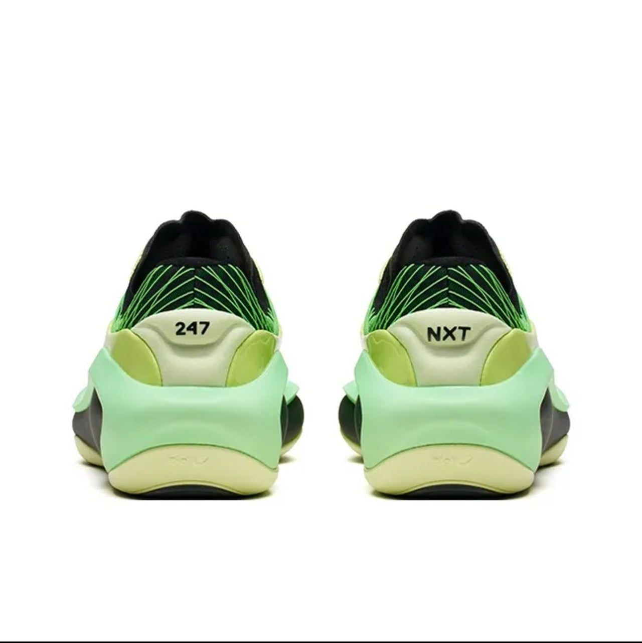 A pair of 247 sneakers shown from the back, featuring a light green and black upper with a yellow-green midsole and the '247' and 'NXT' logos visible.
