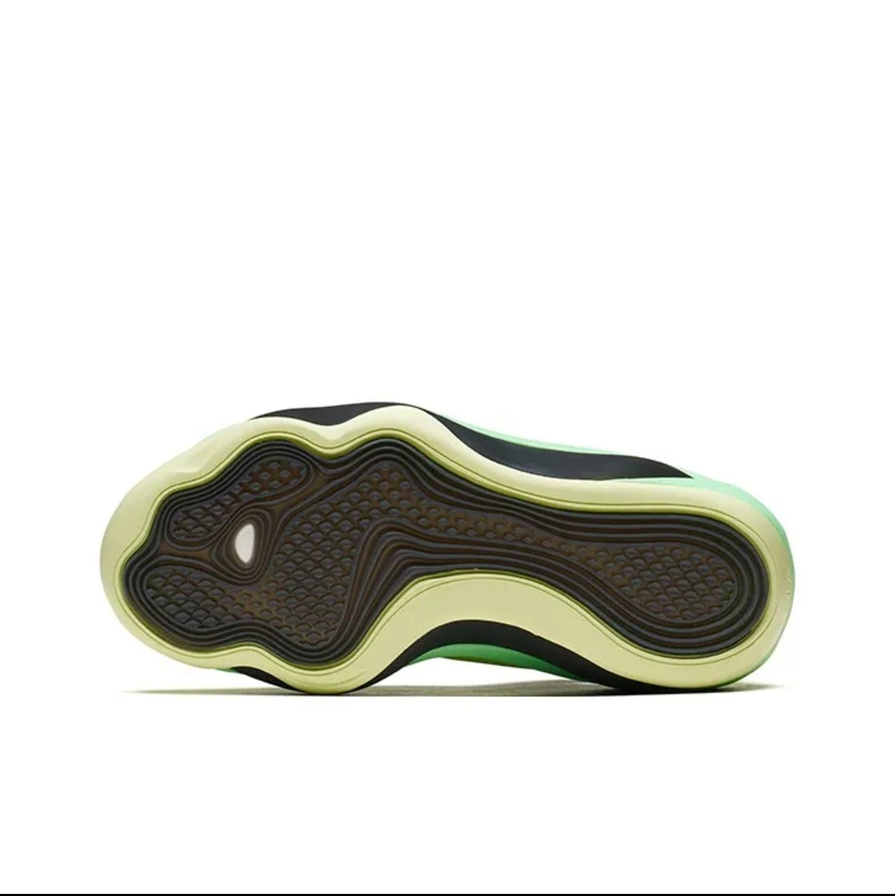 A close-up of a sneaker's outsole showing a black and dark brown tread pattern with a translucent pale yellow-green edge, displayed on a white background within a mobile app screenshot.