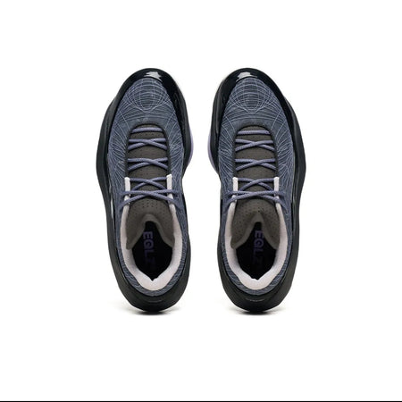 A pair of athletic shoes shown from a top-down view on a white background, with a black phone app interface framing the photo.