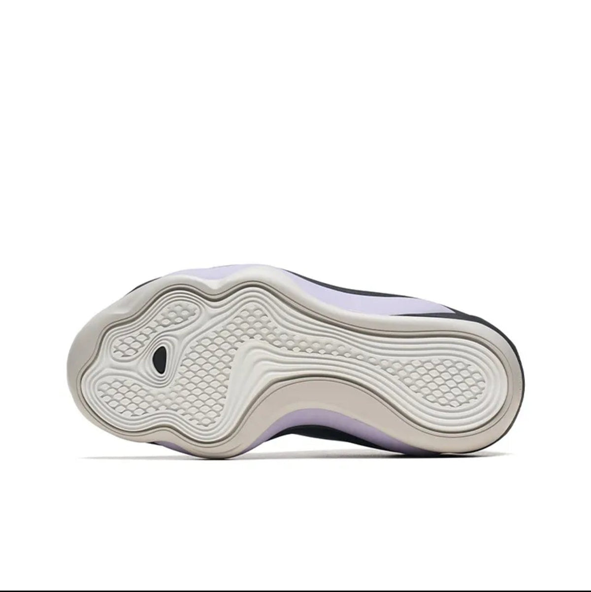 A close-up of a shoe sole, showing a white textured outsole with a light gray and white patterned upper section and subtle lavender-purple accents along the sides.