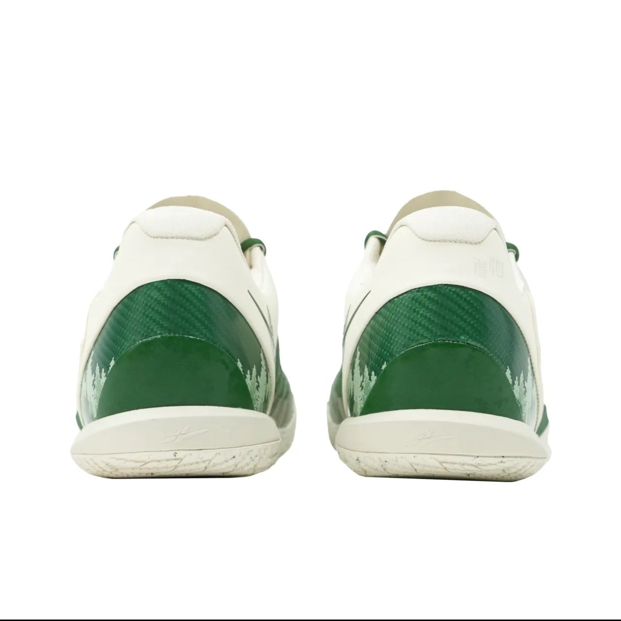 A pair of white sneakers shown from the back, featuring glossy dark green heel panels and white soles, displayed on a white background within a mobile app screenshot.