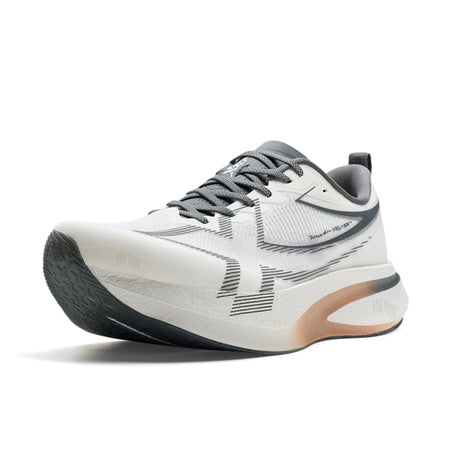 A white and gray athletic running shoe with a black outsole and a small peach-colored accent on the heel, shown on a white background.