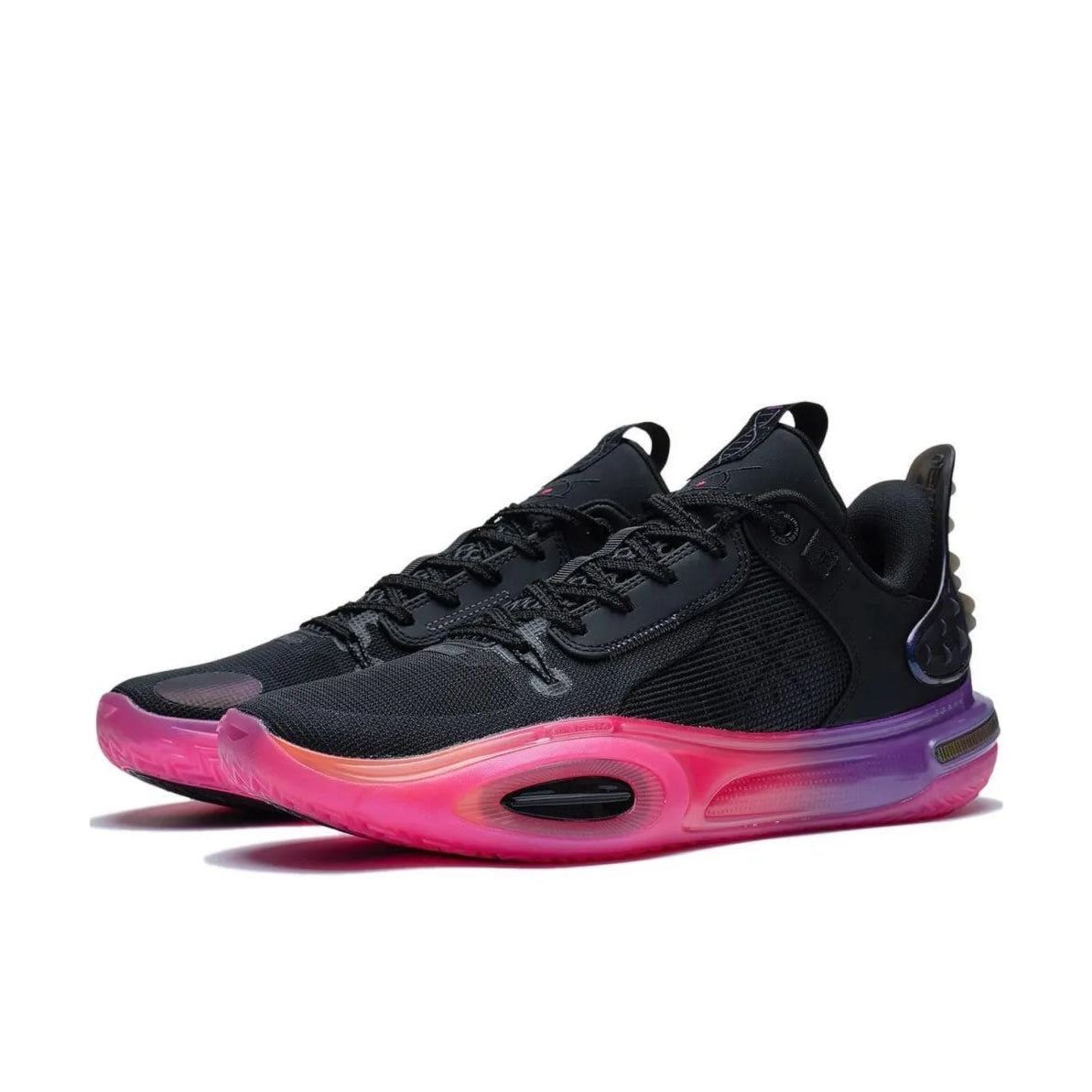 Black athletic sneakers with a vibrant pink and purple gradient midsole, shown on a white background.