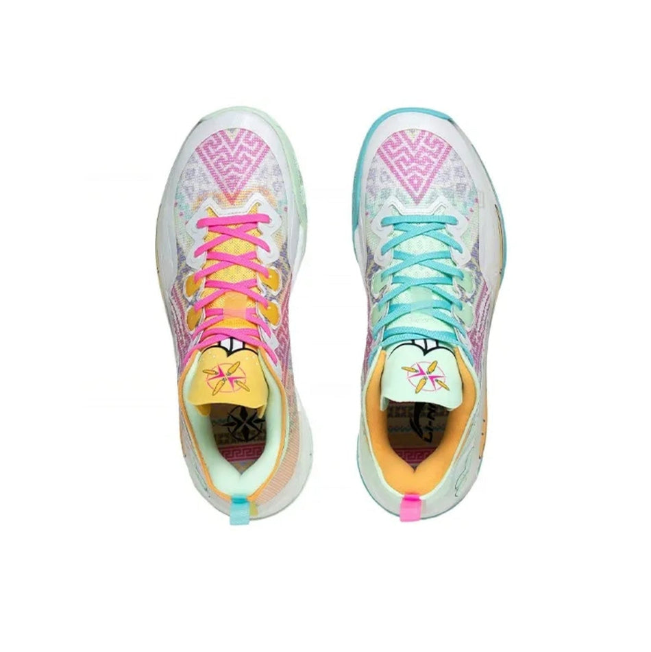 A pair of colorful athletic sneakers shown from a top-down view on a white background, with one shoe featuring pink laces and the other featuring turquoise laces.