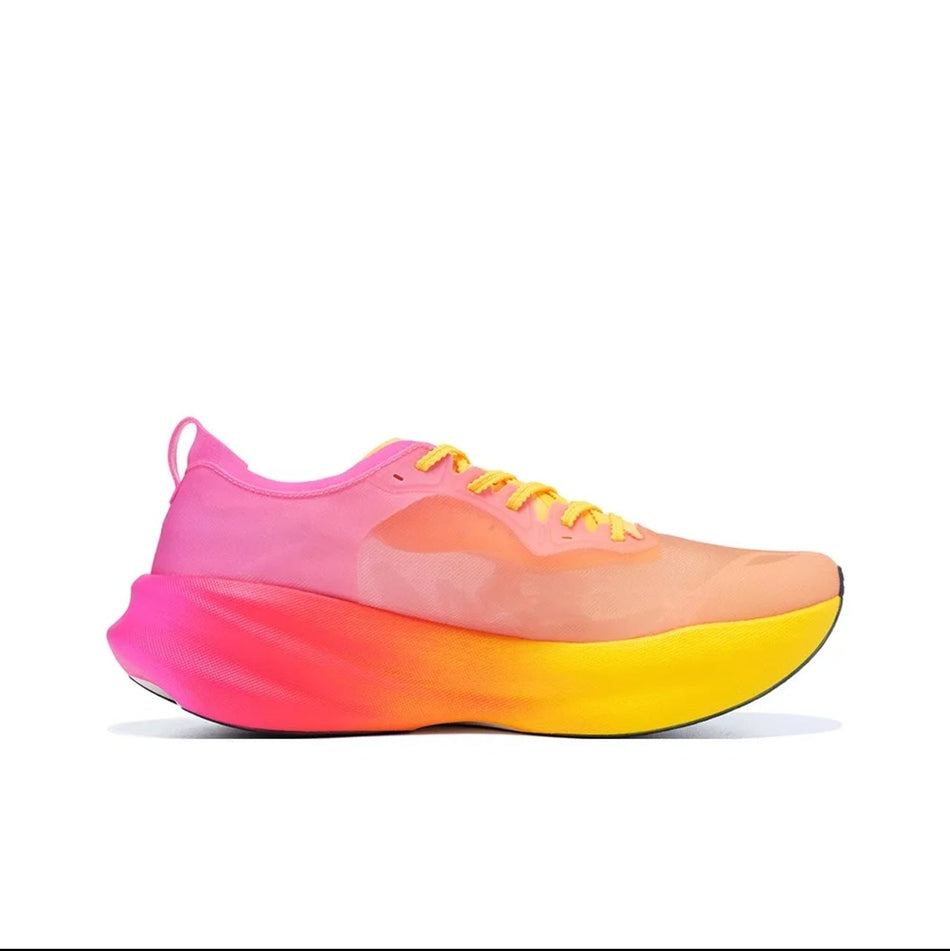A single athletic running shoe shown in side profile on a white background, with a bright gradient color scheme transitioning from pink at the toe and heel to orange in the middle and yellow on the midsole.
