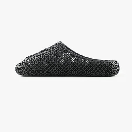 3D printed slippers, black side view with textured strap and open toe