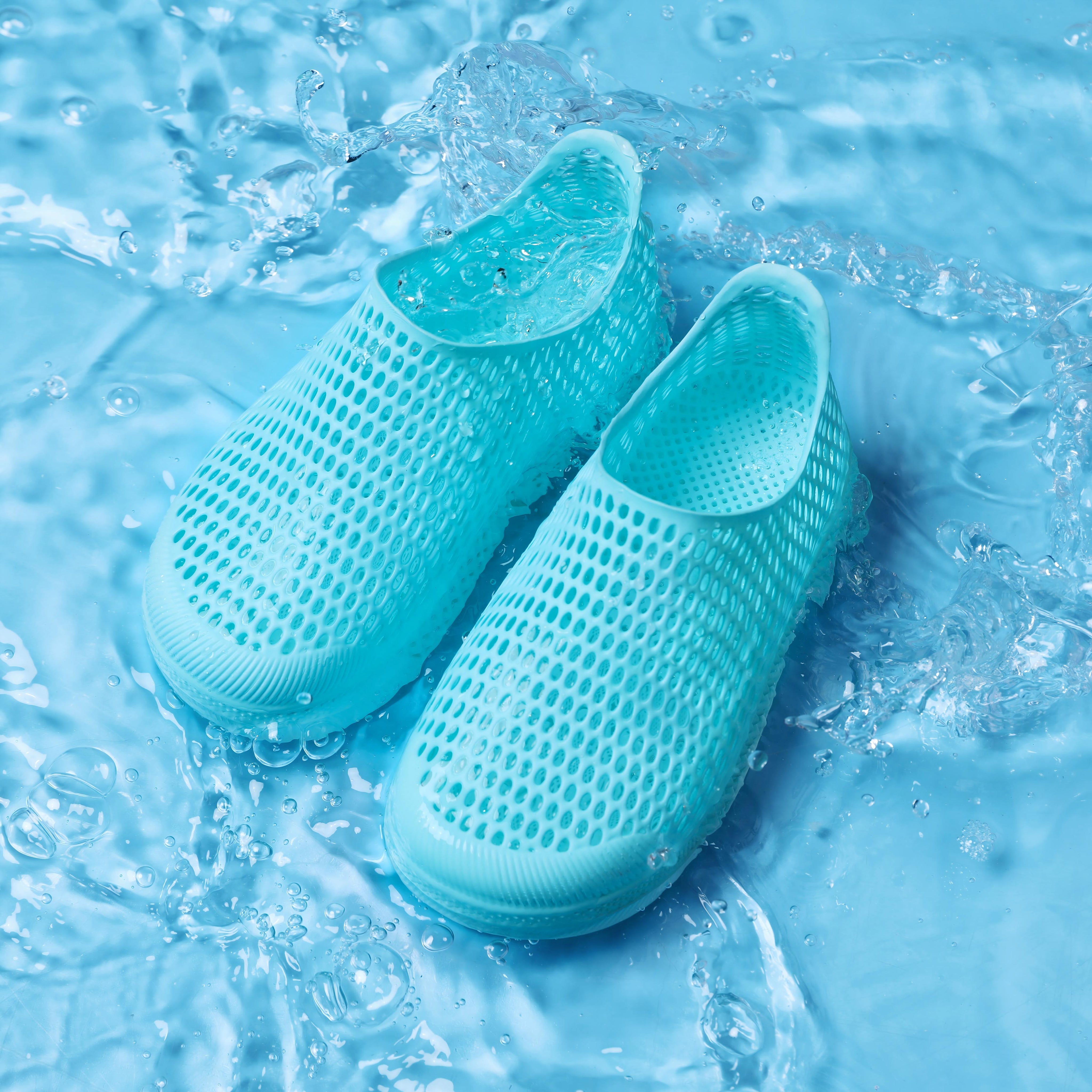 Light blue kids 3D printed slip-on shoes with open mesh upper and cushioned sole