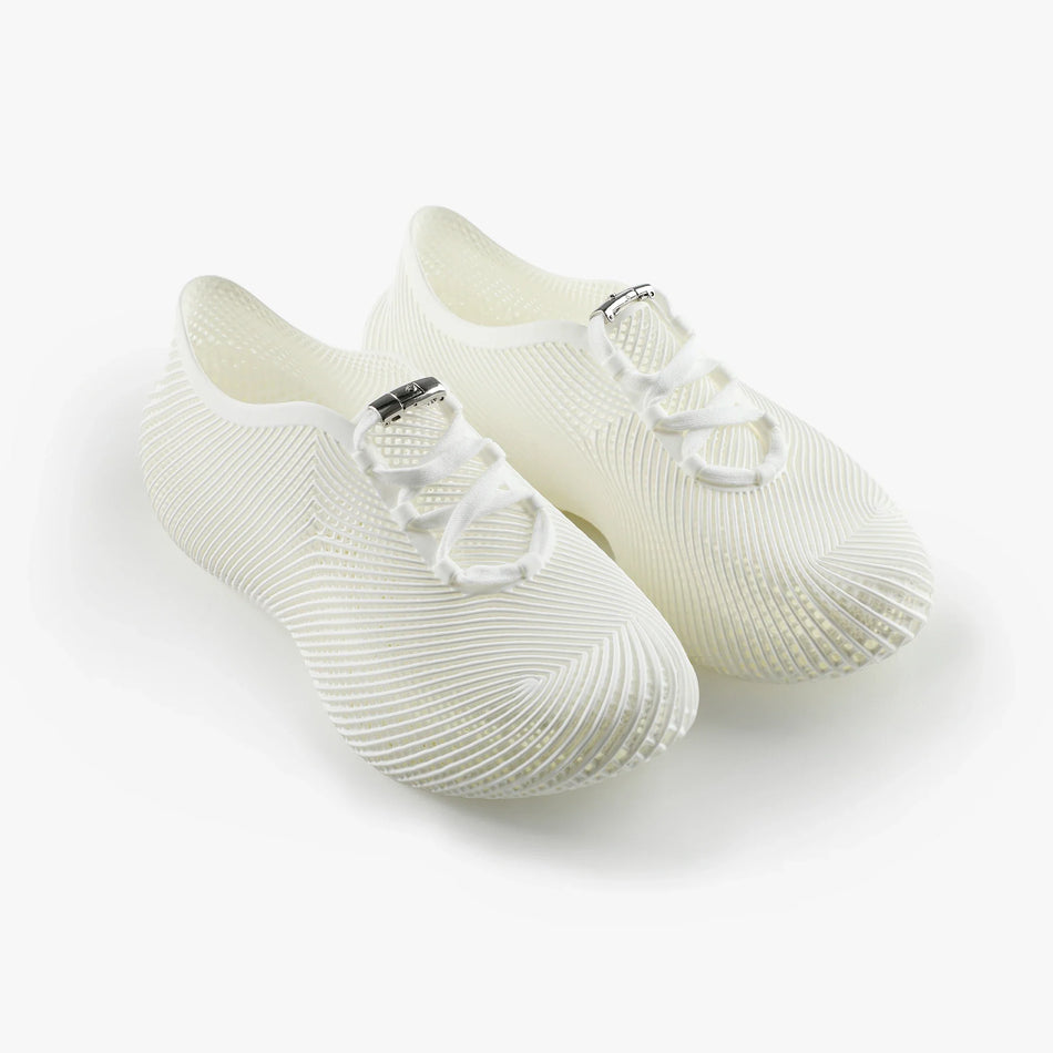 White 3D printed sneakers with lace-up straps and perforated, ribbed upper