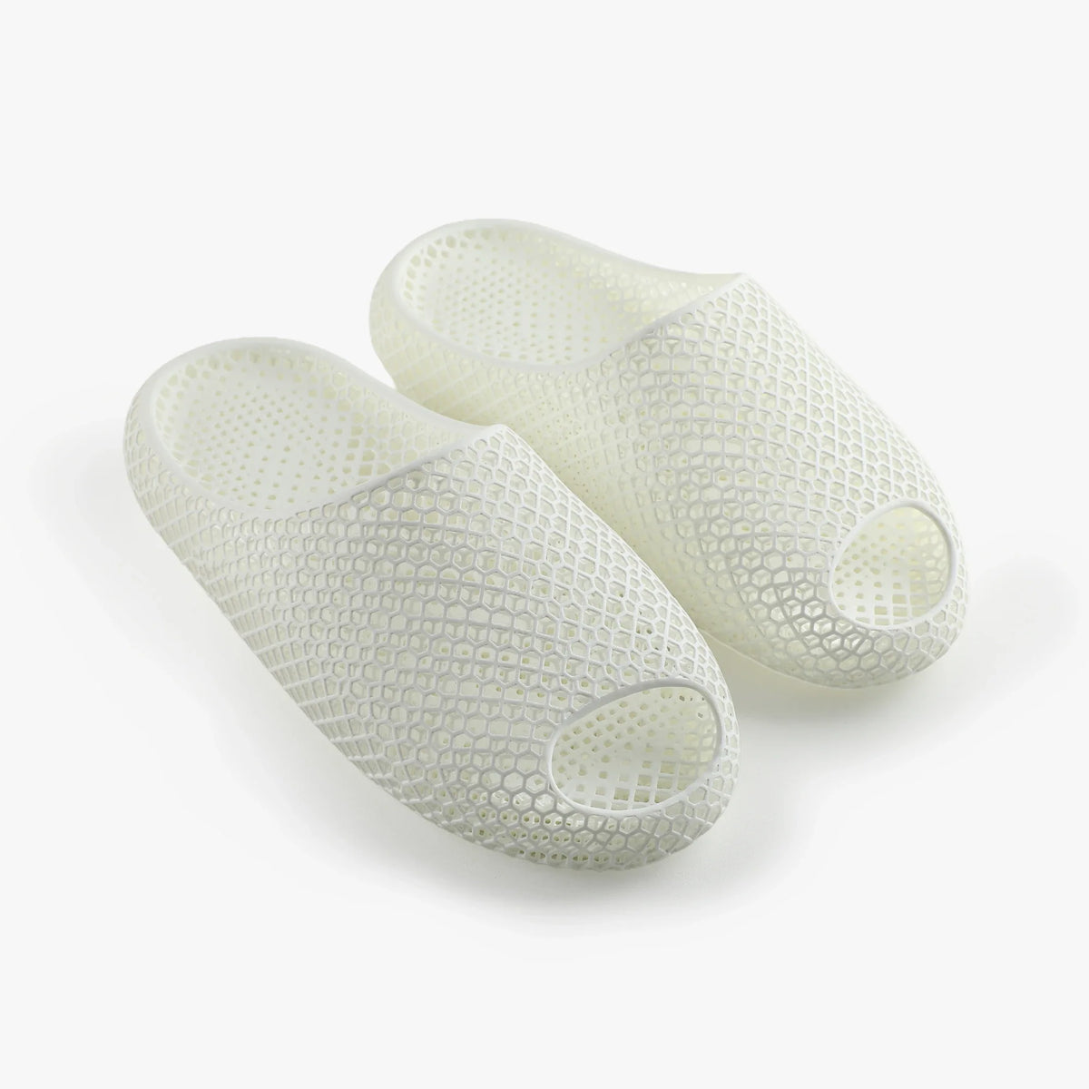 3D printed slippers, white with honeycomb texture and open toe design