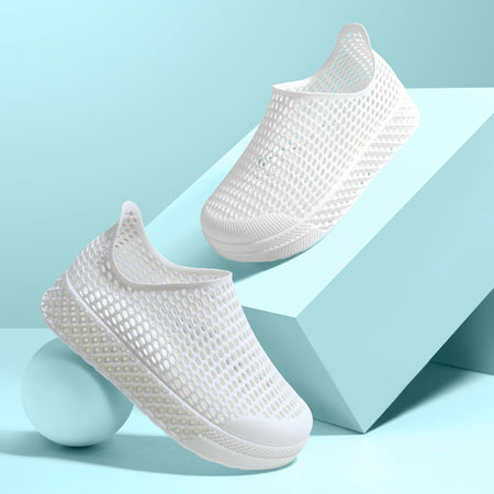 White kids 3D printed slip-on shoes with textured mesh upper and cushioned sole